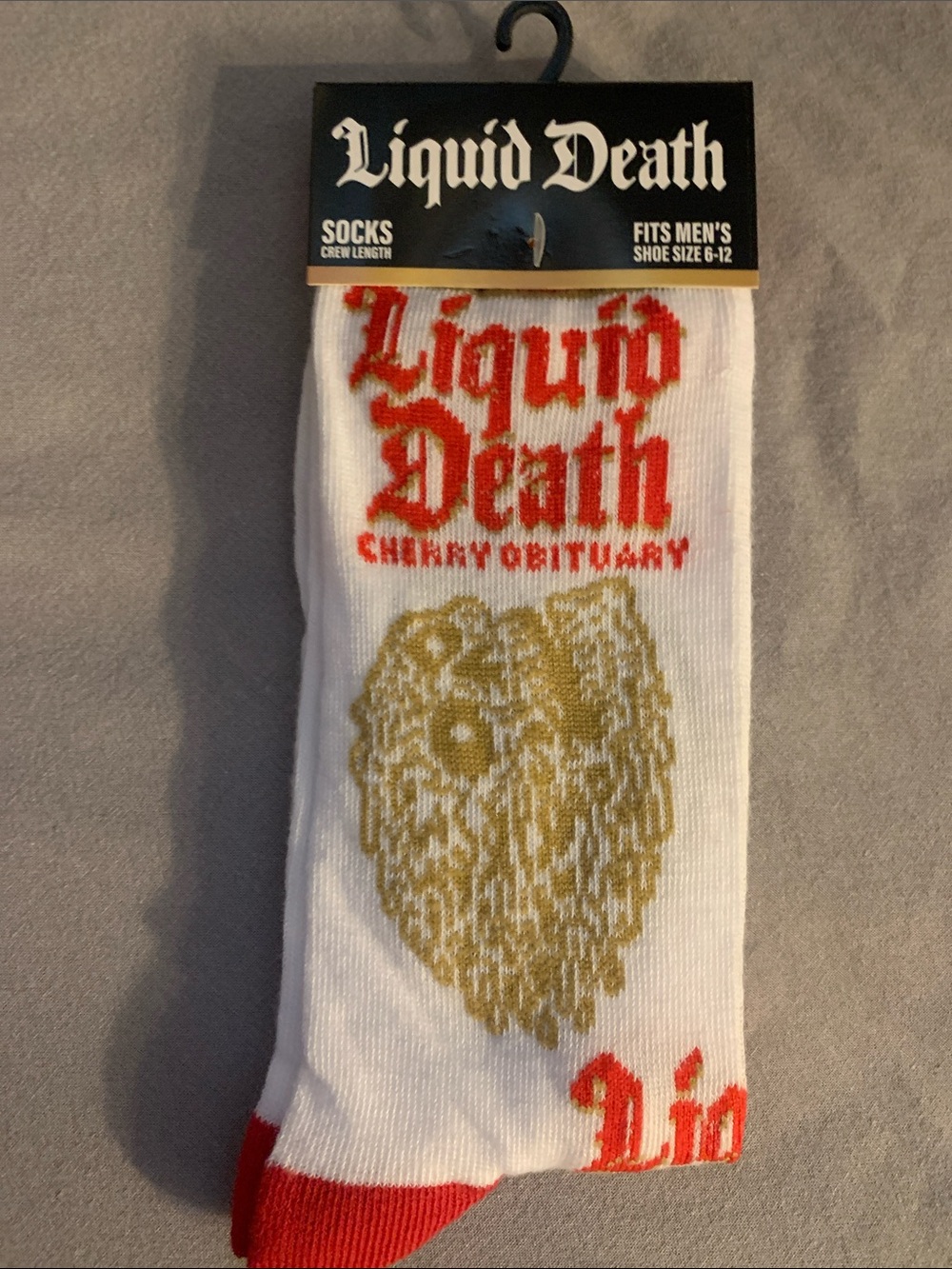 🆕-Men's LIQUID DEATH BRANDED Crew Socks in White with Gold & Red Graphics